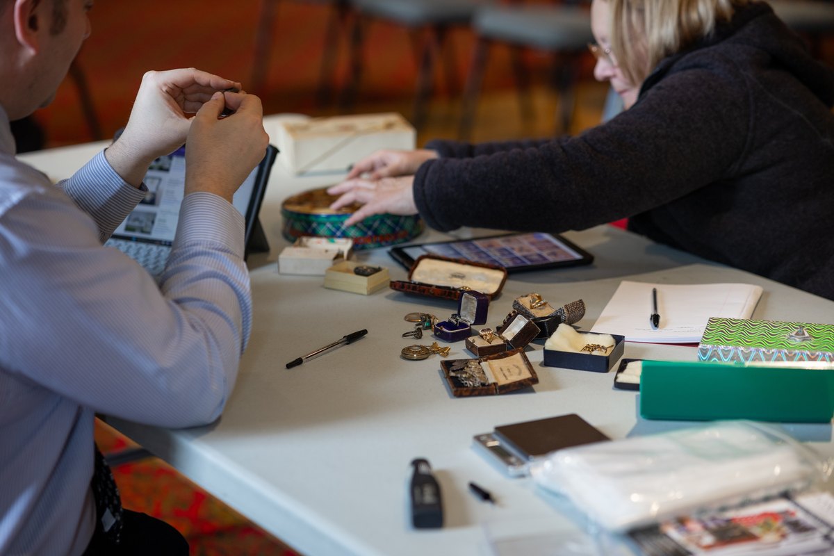 Valuers recording items for a probate inventory